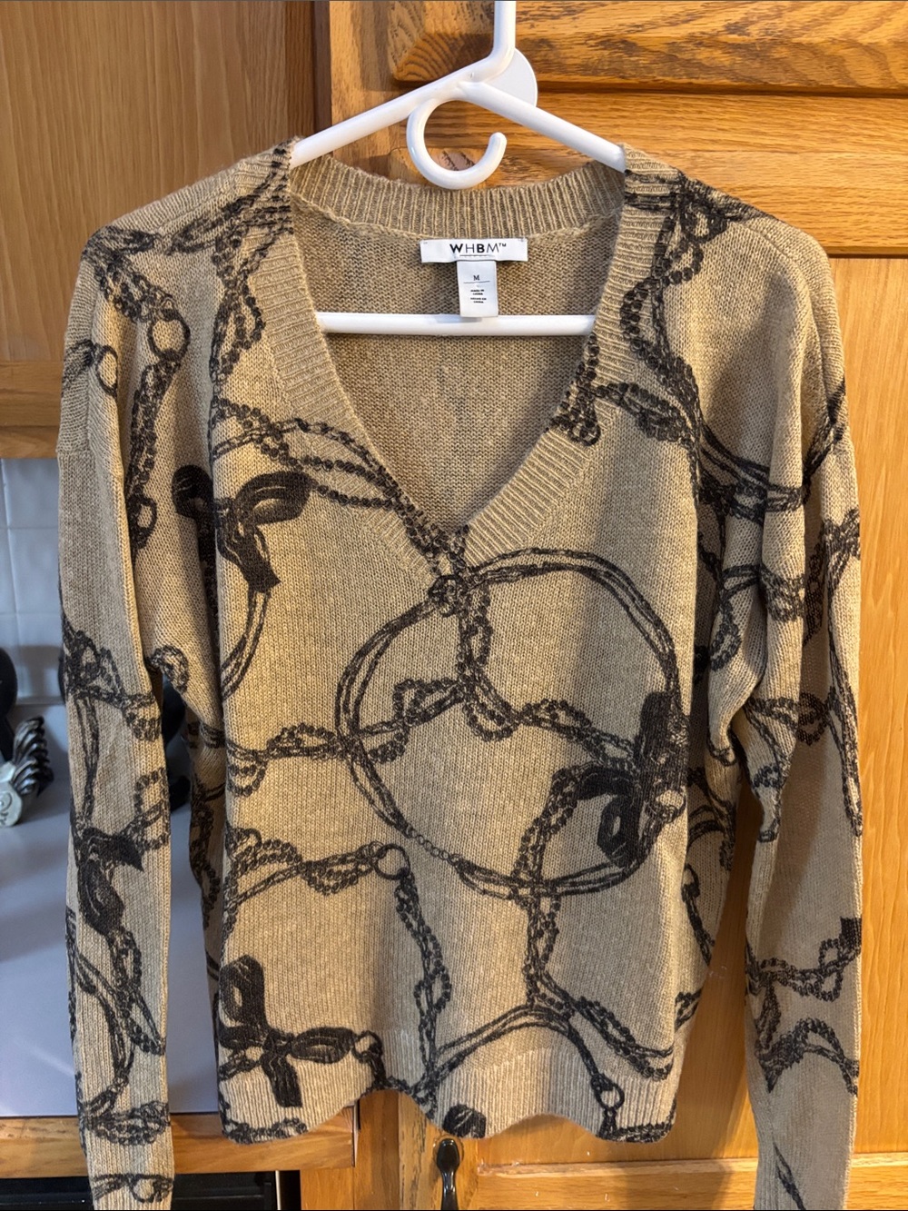 White House Black Market Tan V-Neck Sweater with Black Chain Motif